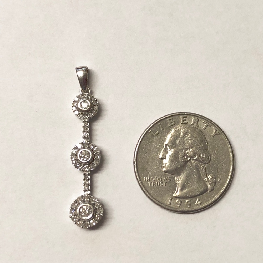 14k white gold,  1/2ct diamond pendant.